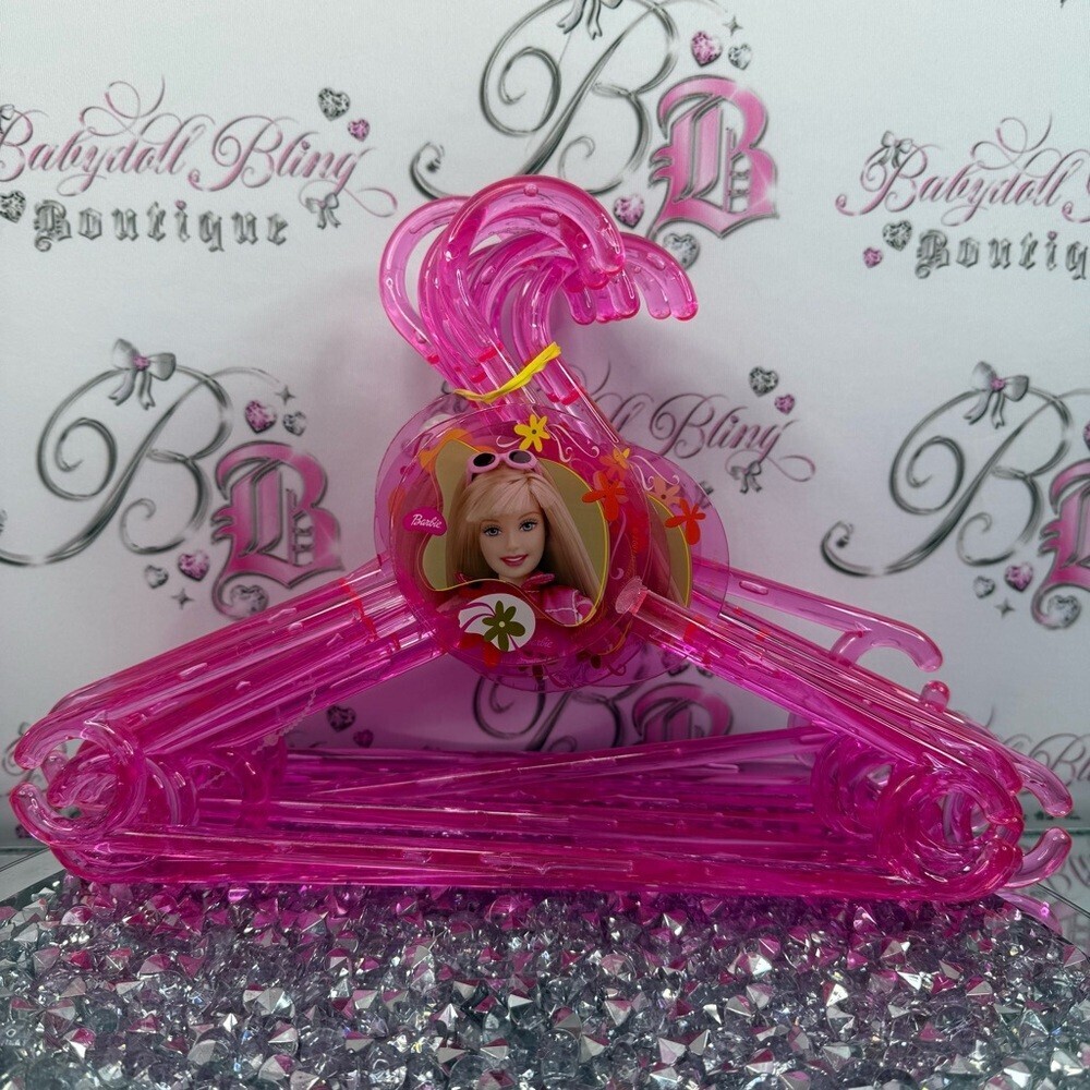 12 Barbie hangers 2001 Bright Pink acrylic Plastic Hangers with Character Accent